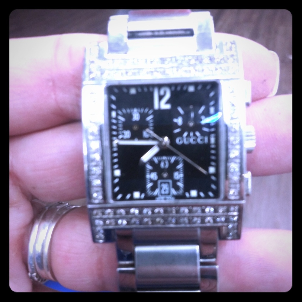 Gucci watch with 80 0.25k diamonds inlaid in face